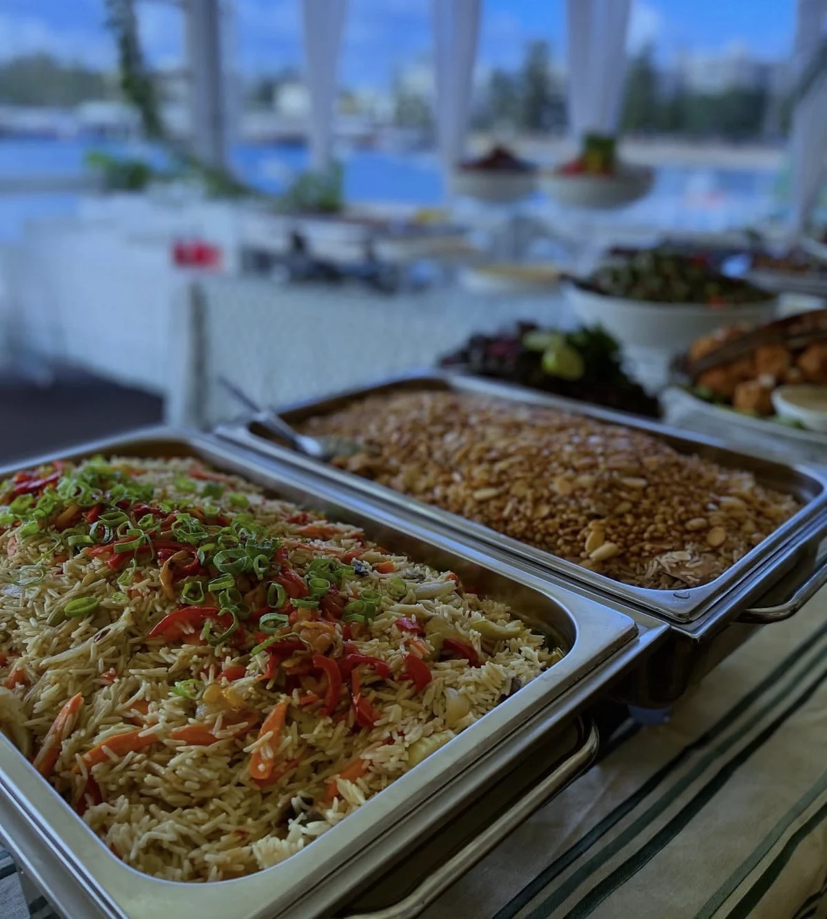Hot dishes and rice platters at a celebration